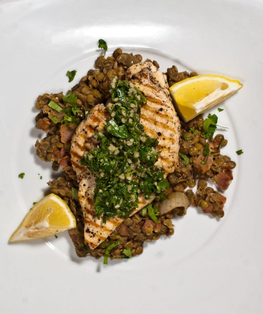 Grilled Chicken Paillard with Gremolata on Warm Lentil Salad with Bacon and Herbs