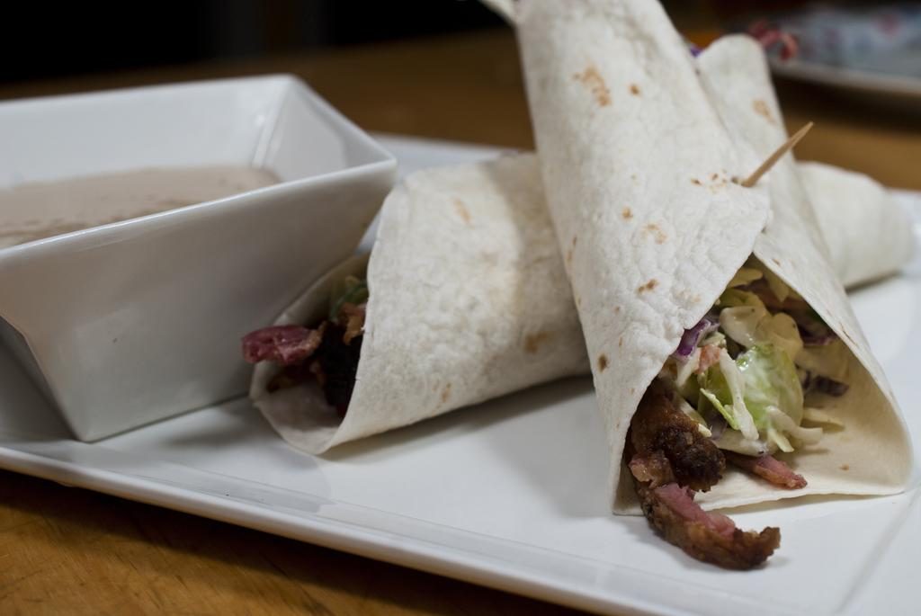 Smoked meat taco with spicy coleslaw and Stout dip