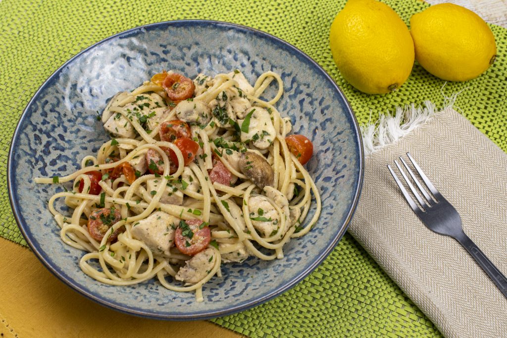 Lemon Chicken Linguine w/ mushrooms & cherry tomatoes in a white wine garlic parm sauce