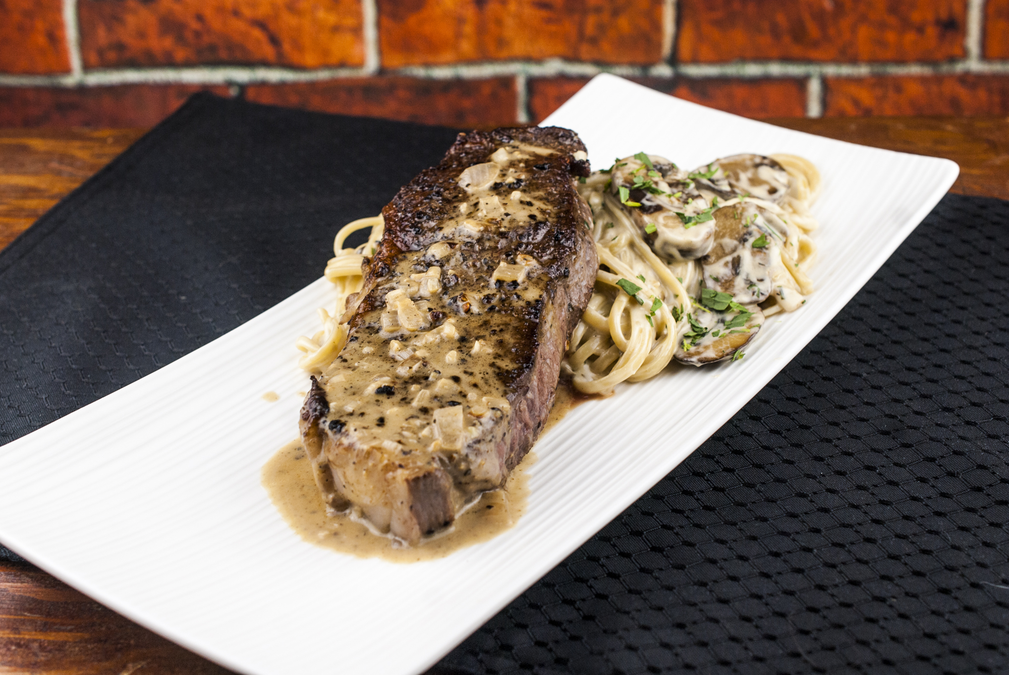 Steak Au Poivre with Linguine in Creamy Mushroom and Tarragon Sauce