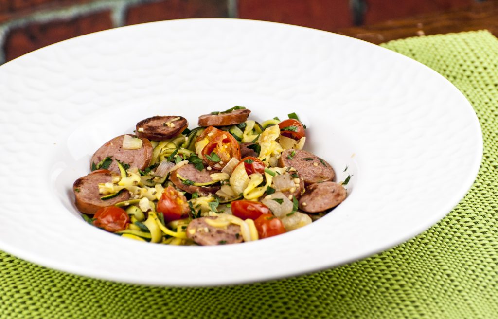 Zucchini Noodles with Smoked Sausage and Cherry Tomatoes in a Zesty Pan Sauce